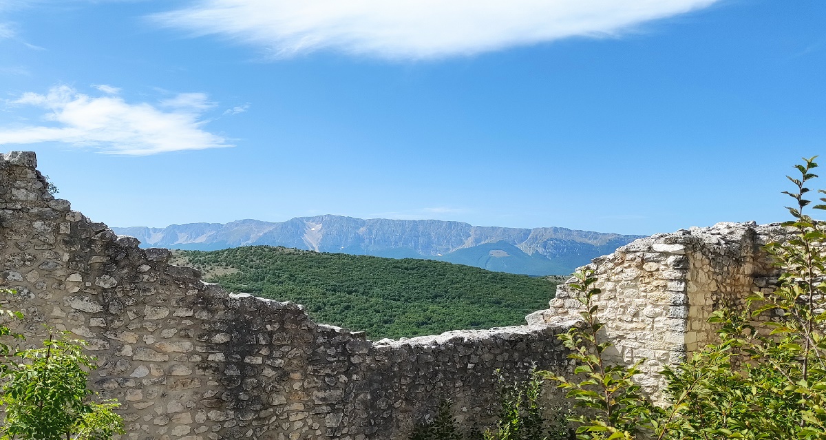 Ruined walls of Bominaco Castle and view