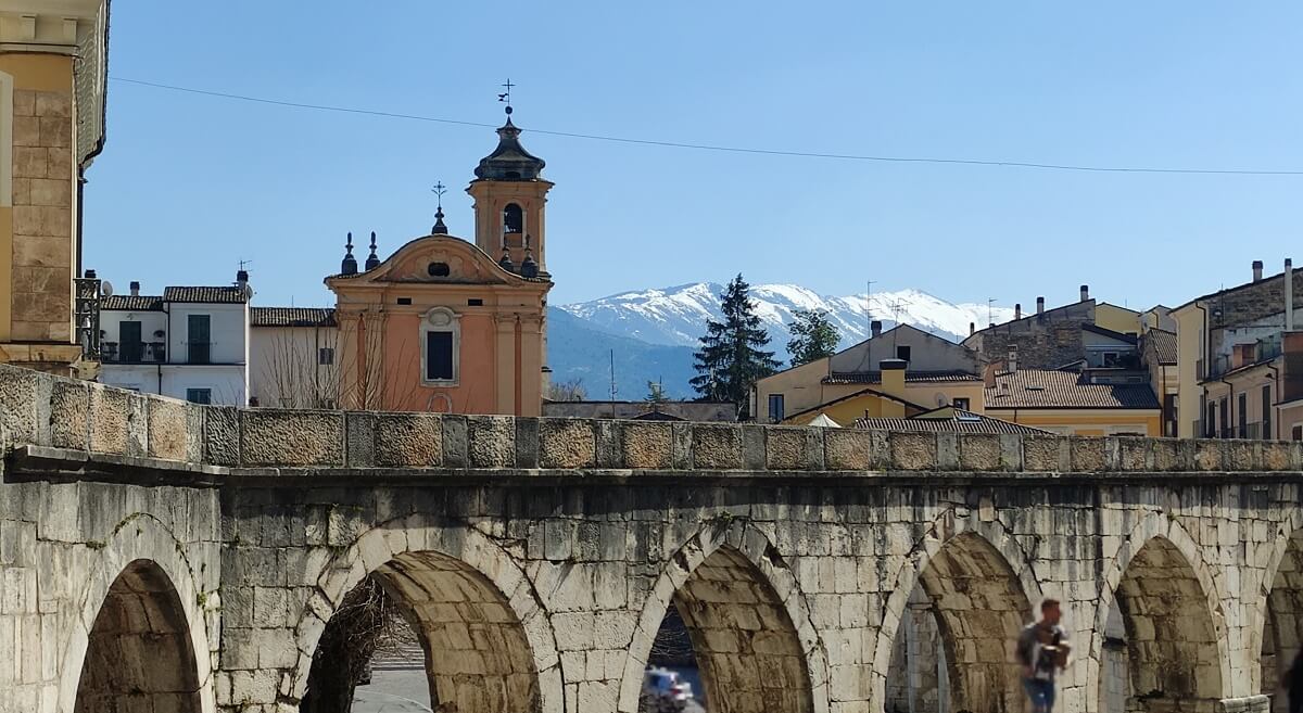 Aqueduct in Sulmona and mountains in background
