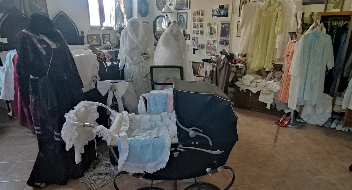 Room in the civic museum, Montepagano, with pram in foreground