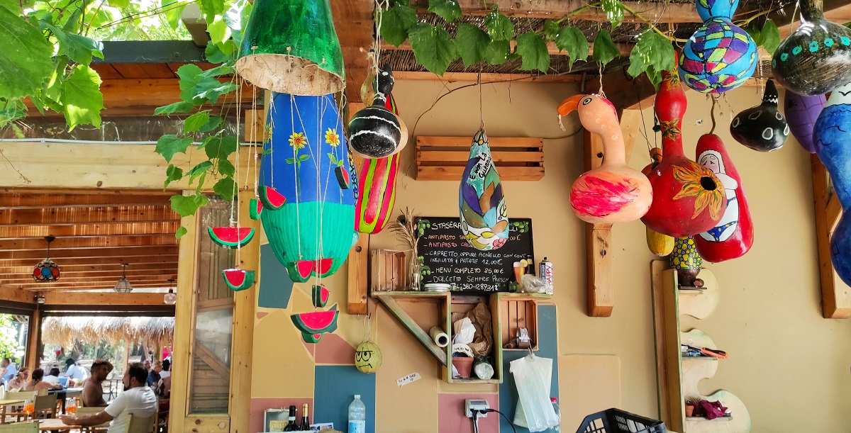 colourful decorations in café kitchen seen on our walk in the woods at Pineto
