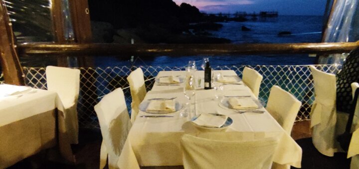 table set for dinner on a Trabocco