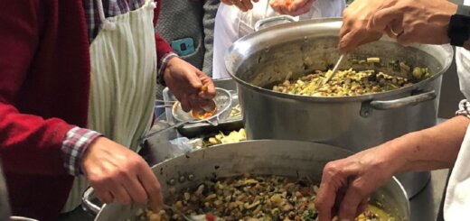 women's hands stirring pots of Le Virtù