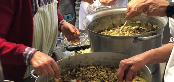 women's hands stirring pots of Le Virtù