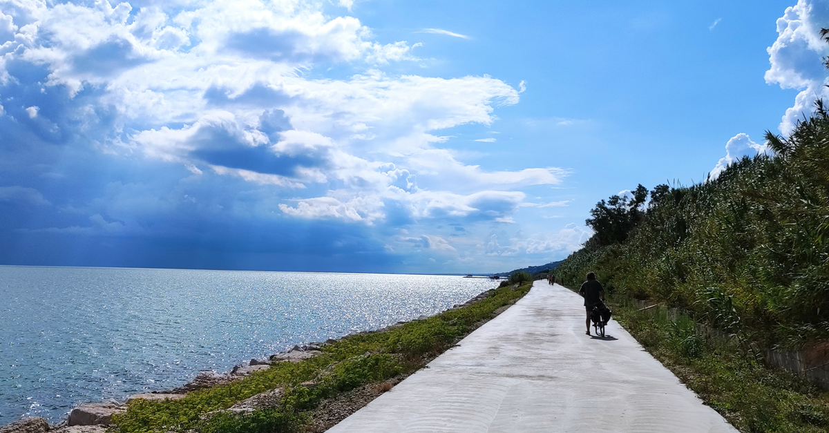Cycle path with sea on left