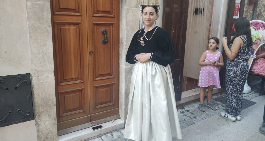 Young woman posing in traditional costume of Scanno